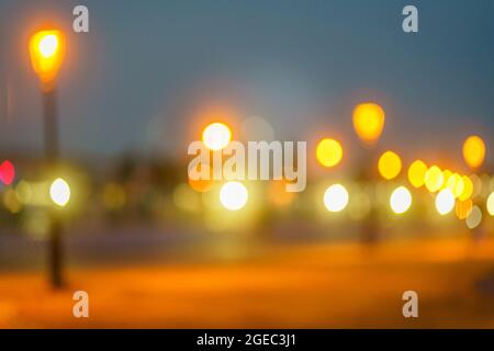 Abstract background with bokeh from light of night lights, car headlights, evening lights of city Stock Photo