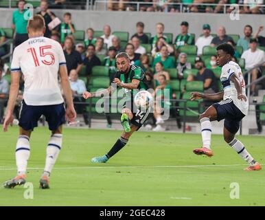 Austin, Texas, USA. August 18, 2021: Austin FC forward Diego Fagundez (14) takes a shot on goal during a Major League Soccer match between Austin FC and the Vancouver Whitecaps on August 18, 2021 in Austin, Texas. (Credit Image: © Scott Coleman/ZUMA Press Wire) Credit: ZUMA Press, Inc./Alamy Live News Stock Photo