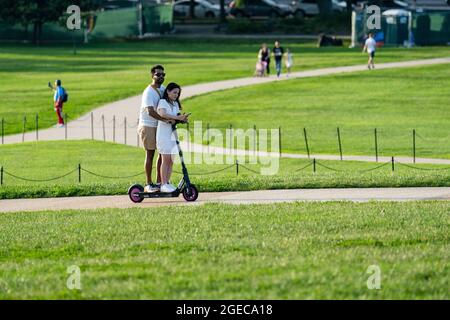 Washington, USA. 18th Aug, 2021. Tourists visit the National Mall in Washington, DC, the United States, on Aug. 18, 2021. The United States will begin administrating COVID-19 booster shots next month as new data shows that vaccine protection wanes over time, top U.S. health officials announced Wednesday. Credit: Liu Jie/Xinhua/Alamy Live News Stock Photo