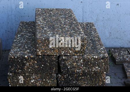 Cleanly washed stair stones lie on the floor. Stock Photo