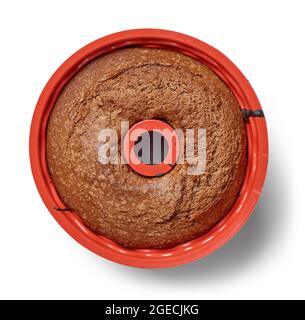 freshly baked chocolate cake in baking form isolated on white background, top view Stock Photo