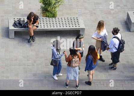 London, England, UK. Young people on the South Bank outside the National Theatre Stock Photo