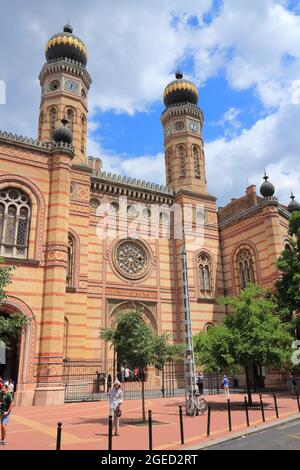 BUDAPEST, HUNGARY - JUNE 22, 2014: People visit Dohany Street Synagogue in Budapest. It is the largest city in Hungary and 9th largest in the EU (3.3 Stock Photo