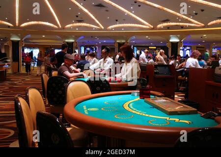 LAS VEGAS, USA - APRIL 14, 2014: People visit Bellagio resort in Las Vegas.  The famous casino resort has almost 4,000 rooms Stock Photo - Alamy