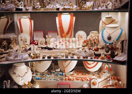 Coral jewelry in Croatia. Jewellery shop window display in Dubrovnik, Croatia. Adriatic coral. Stock Photo