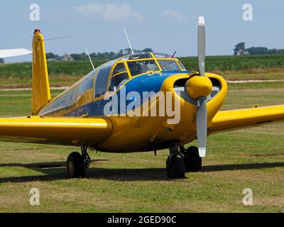 Classic propeller driven aeroplane on the ground at Texel island airfield, the Netherlands Stock Photo
