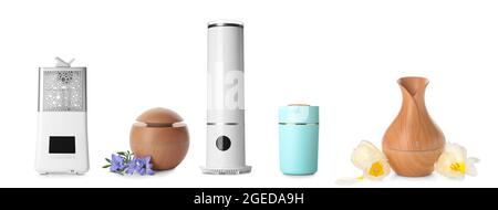 Different modern humidifiers on white background Stock Photo