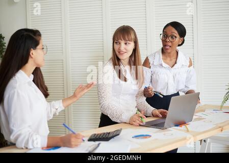 Group of diverse business women leaders working together at the office. Women only business office. Stock Photo