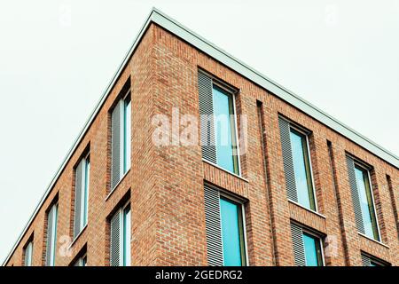 Detail of a modern office block featuring a sleek contemporary design. Stock Photo