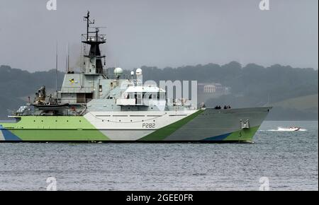 Falmouth Harbour, Cornwall, UK. 19th Aug 2021. Royal Navy Patrol ship HMS Severn P282 departs Falmouth Harbour in her new “Western Approaches” camouflage livery, first used on ships in World War Two. The livery is a tribute to all sailors who died and fought in the Battle of the Atlantic. HMS Severn will be re-commissioned on the 28th of August 2021 Credit: Bob Sharples/Alamy Live News Stock Photo