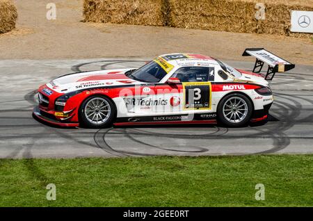 2012 Mercedes-Benz SLS AMG GT3 endurance racer racing car driving up the hill climb track at the Goodwood Festival of speed motor racing event 2014. Stock Photo