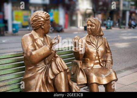 Statue of two women having a chat while stting on bench in Eskisehir, Turkey. Stock Photo