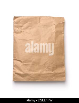 Top view of crumpled brown kraft paper package bag isolated on white Stock Photo