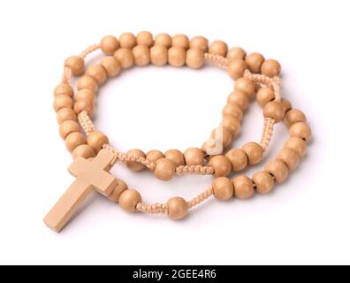 Wooden rosary beads and cross isolated on white Stock Photo