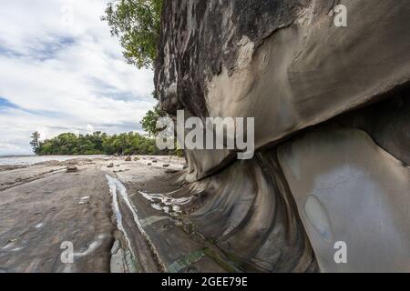 abstract rock shapes on the stony coast of borneo - malaysia Stock Photo