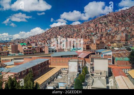 Houses of La Paz, Bolivia. Cemetery in the bottom. Stock Photo