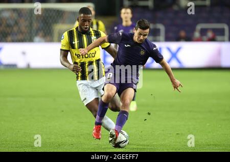 OHL's Xavier Mercier and Anderlecht's Josh Cullen fight for the