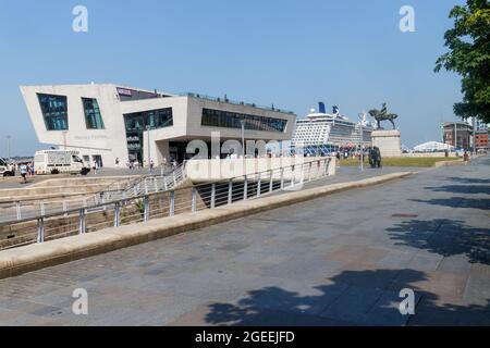 Cruise ship Celebrity Silhouette at Liverpool Cruise Terminal. The Mersey Ferries terminal is in the foreground. Stock Photo
