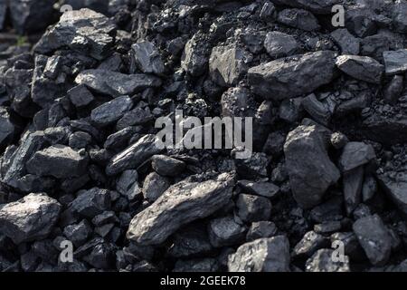 Black coal, mineral, stove and fireplace fuel. Background, texture of stones. Stock Photo