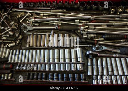 Open shelf of the toolbox with variedy of sockets. Stock Photo