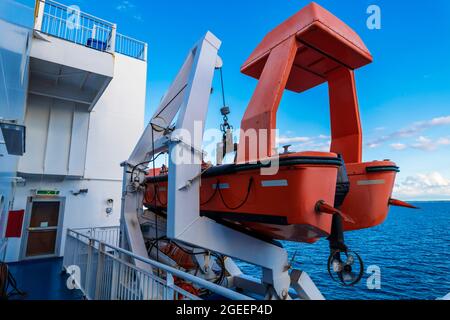 Fast Rescue Boat on a ship Stock Photo