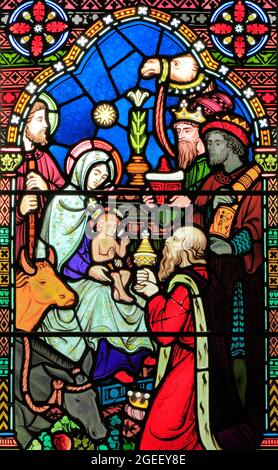 Adoration of the Magi, Three Kings visit Mary, Joseph, baby Jesus, stained glass window, by Frederick Preedy, 1865, Gunthorpe, Norfolk, England, UK Stock Photo