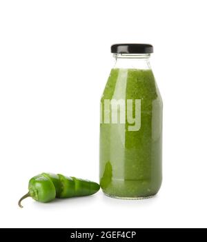 Bottle of Tomatillo Salsa Verde sauce on white background Stock Photo