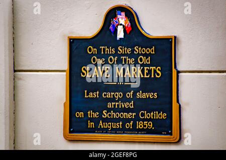 A historic marker stands at the site of a former slave market, Aug. 14, 2021, in Mobile, Alabama. The slave ship Clotilda arrived in Mobile in 1860. Stock Photo