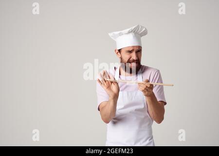 man in white apron professionals restaurant kitchen industry Stock Photo
