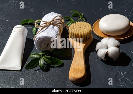 bathroom accessories on black background. Home spa treatment. Personal tools for skin care. Stock Photo