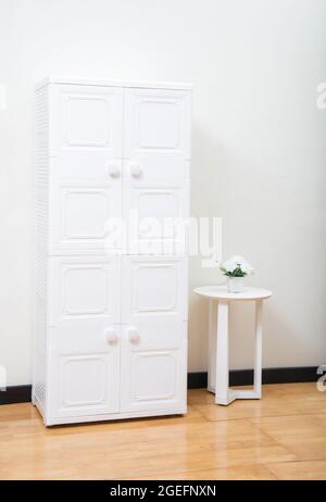 white plastic wardrobe in minimal style in the bedroom Stock Photo