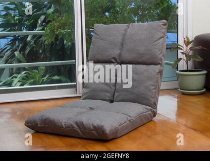 Adjustable sofa seat on the wooden floor in the living room Stock Photo