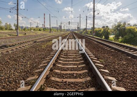 Railway tracks tending far away to horizon. Stock Photo