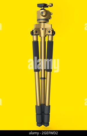 Photo and video gold tripod with smartphone adapter and quick release plate isolated on yellow background. 3D rendering and illustration of profession Stock Photo