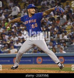 Los Angeles, USA. 20th Aug, 2021. New York Mets' starting pitcher Taijuan Walker winds up to deliver during the fourth inning at Dodger Stadium in Los Angeles on Thursday, August 19, 2021. The Dodgers used a bullpen game to defeat the Mets 4-1 for their seventh in a row. Photo by Jim Ruymen/UPI Credit: UPI/Alamy Live News Stock Photo