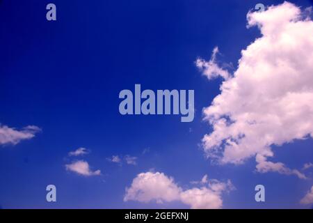 Beautiful blue sky and white cloud background. Stock Photo