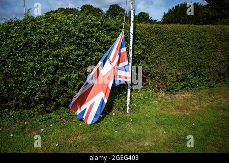 Garden flag at half-mast Stock Photo
