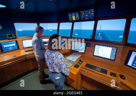 Technical college “Lycee Pierre Loti” in Paimpol (Brittany, north western France: students and teacher in a navigation simulator. Maritime college pre Stock Photo