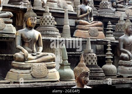 bo, Sri Lanka - February 27, 2019: Buddha statues in Gangaramaya Temple in Colombo city, Sri Lanka Stock Photo