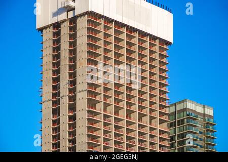 A residential skyscraper under construction in Canary Wharf, London Stock Photo