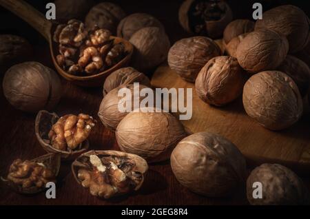 walnuts on a dark background in a rustic style Stock Photo