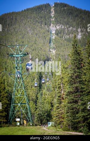 View of the gondola taking up to the Sulphur mountain top in the Banff National park region of Alberta. Stock Photo