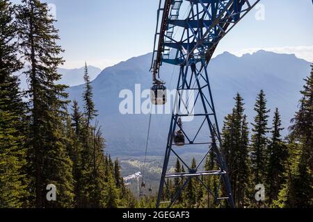 View of the gondola taking up to the Sulphur mountain top in the Banff National park region of Alberta. Stock Photo