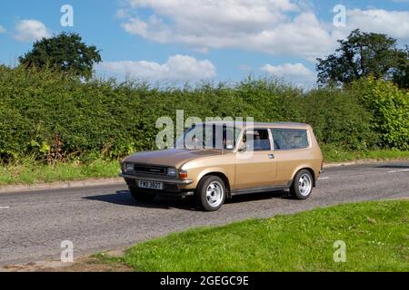 A front view of a 1970s 70s Gold Austin Allegro 1500 Sdl Petrol vintage classic car retro driver vehicle automobile Stock Photo