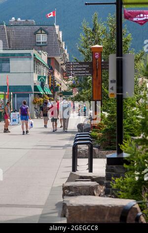 View of tourists on the street of Banff Avenue in Alberta. Stock Photo