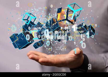Male's hand holding actionable analytics connecting people on the internet Stock Photo