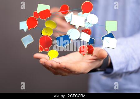 Talk bubble speech icon. Hand holding blank Stock Photo