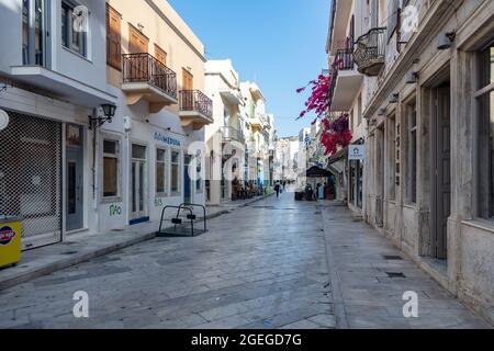 Syros island, Cyclades, Greece. May 27, 2021. Traditional cobblestone street, Ermoupolis capital town. Summer leisure destination. Stock Photo