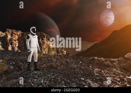 Spaceman walks on the alien planet. Space Mission. Elements of this image furnished by NASA. Stock Photo