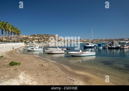 Small motor boats and fishing boats tied up in Kamari harbour, Kefalos, on the island of Kos, Greece Stock Photo
